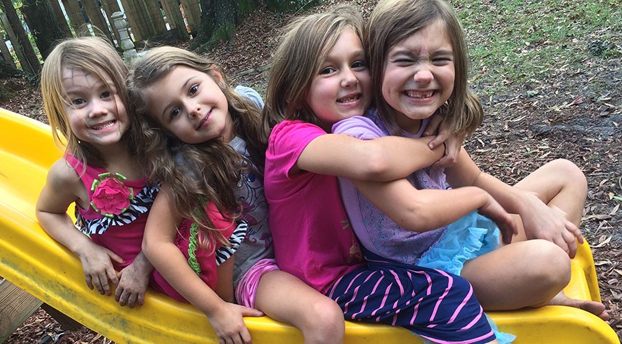 Adeline-Milly-Zoey-Penelope-on-a-Slide